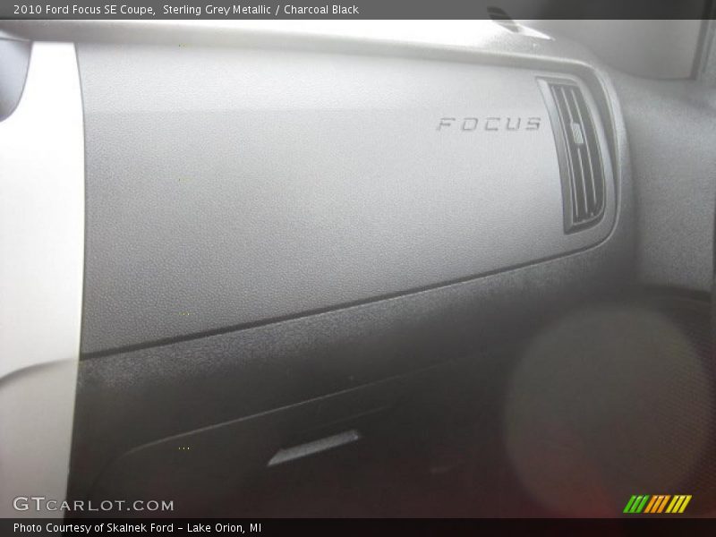 Sterling Grey Metallic / Charcoal Black 2010 Ford Focus SE Coupe