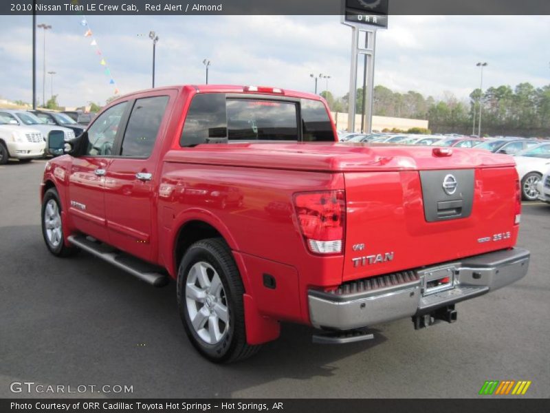 Red Alert / Almond 2010 Nissan Titan LE Crew Cab