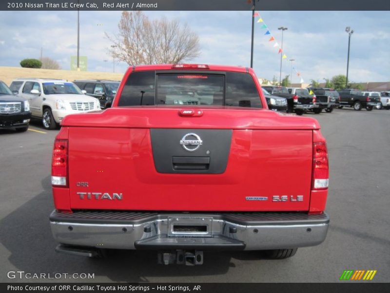 Red Alert / Almond 2010 Nissan Titan LE Crew Cab