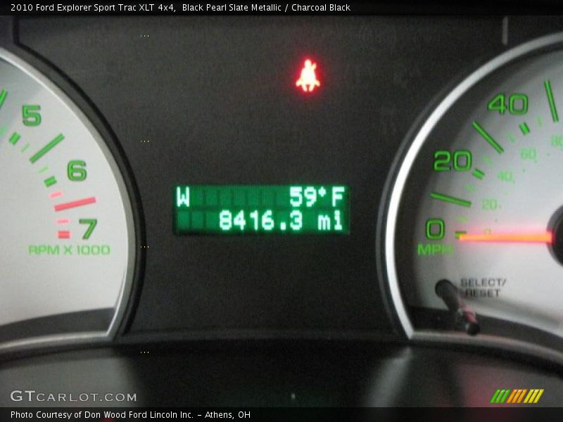 Black Pearl Slate Metallic / Charcoal Black 2010 Ford Explorer Sport Trac XLT 4x4