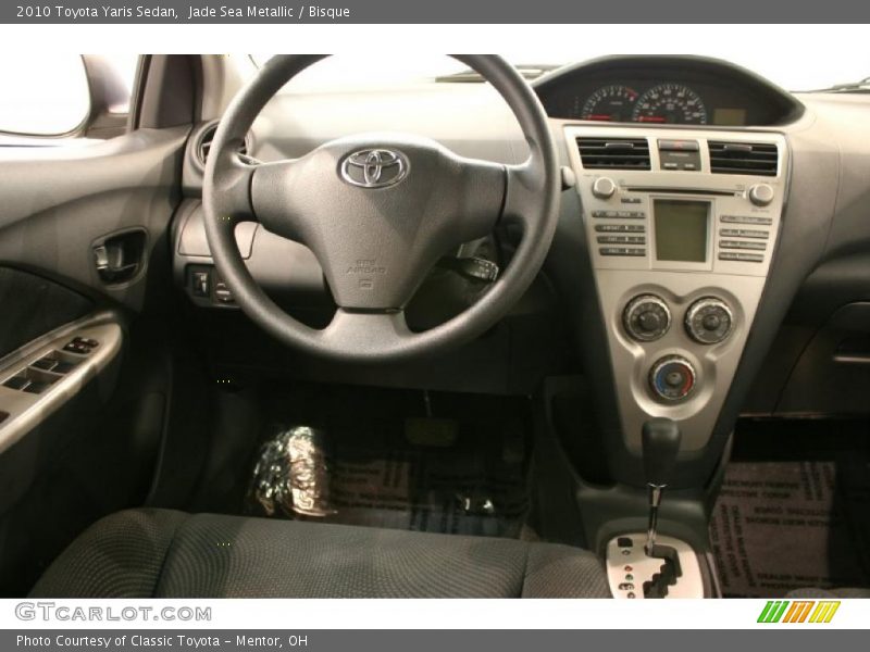 Jade Sea Metallic / Bisque 2010 Toyota Yaris Sedan