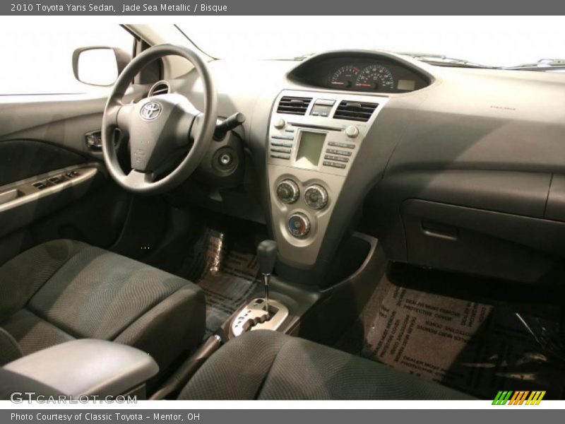 Jade Sea Metallic / Bisque 2010 Toyota Yaris Sedan