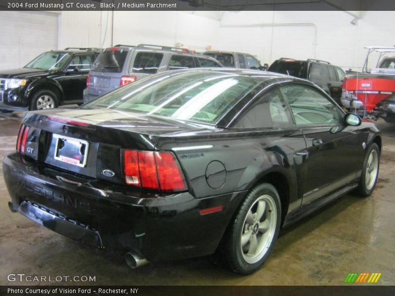 Black / Medium Parchment 2004 Ford Mustang GT Coupe
