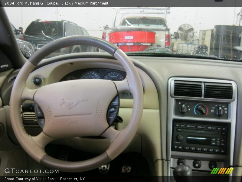 Black / Medium Parchment 2004 Ford Mustang GT Coupe