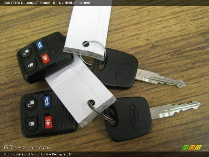 Black / Medium Parchment 2004 Ford Mustang GT Coupe