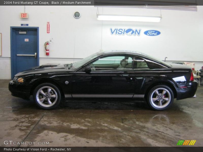 Black / Medium Parchment 2004 Ford Mustang GT Coupe