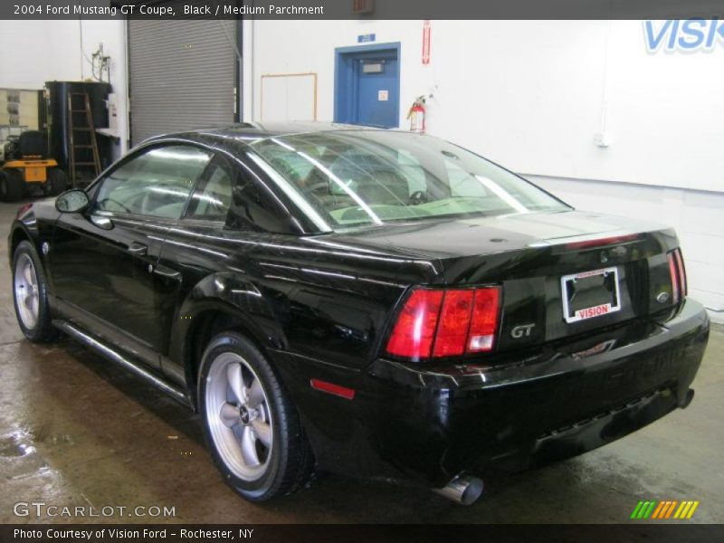 Black / Medium Parchment 2004 Ford Mustang GT Coupe