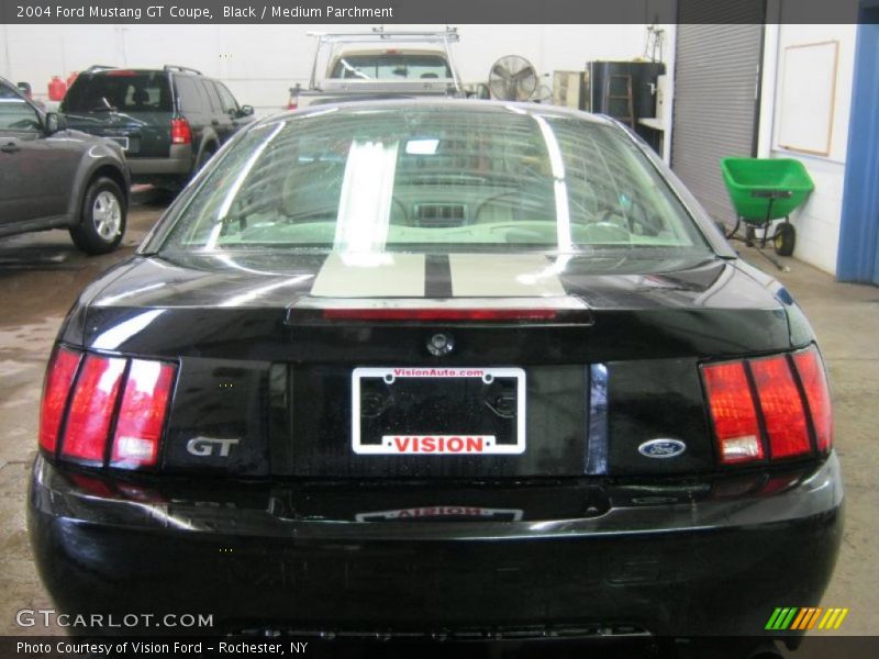 Black / Medium Parchment 2004 Ford Mustang GT Coupe