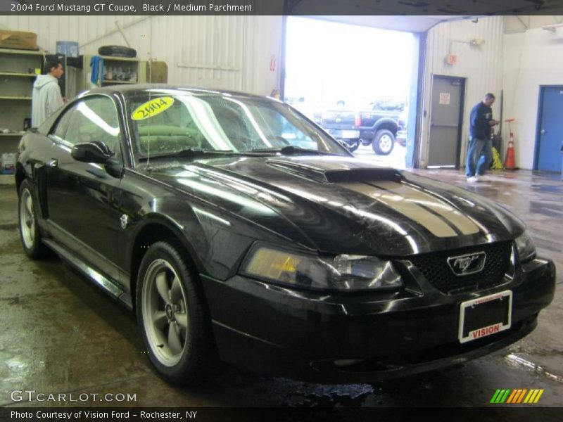Black / Medium Parchment 2004 Ford Mustang GT Coupe