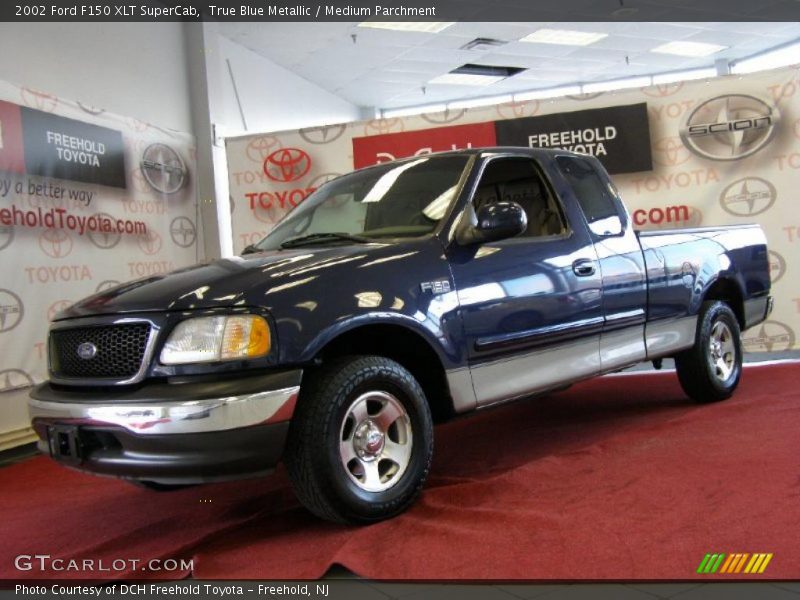 True Blue Metallic / Medium Parchment 2002 Ford F150 XLT SuperCab