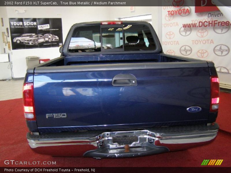 True Blue Metallic / Medium Parchment 2002 Ford F150 XLT SuperCab