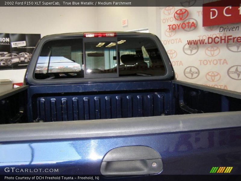 True Blue Metallic / Medium Parchment 2002 Ford F150 XLT SuperCab