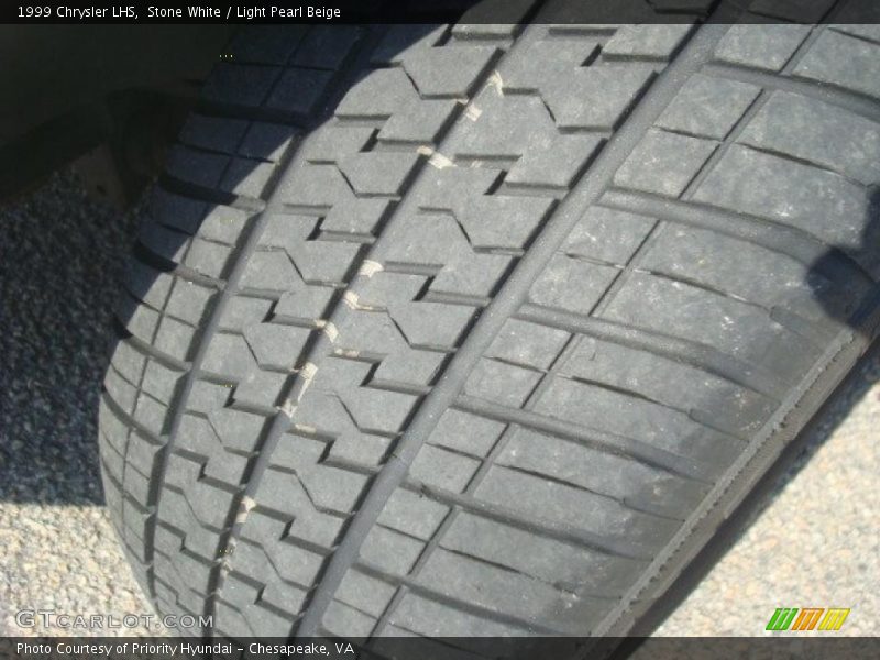 Stone White / Light Pearl Beige 1999 Chrysler LHS