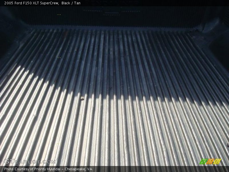 Black / Tan 2005 Ford F150 XLT SuperCrew