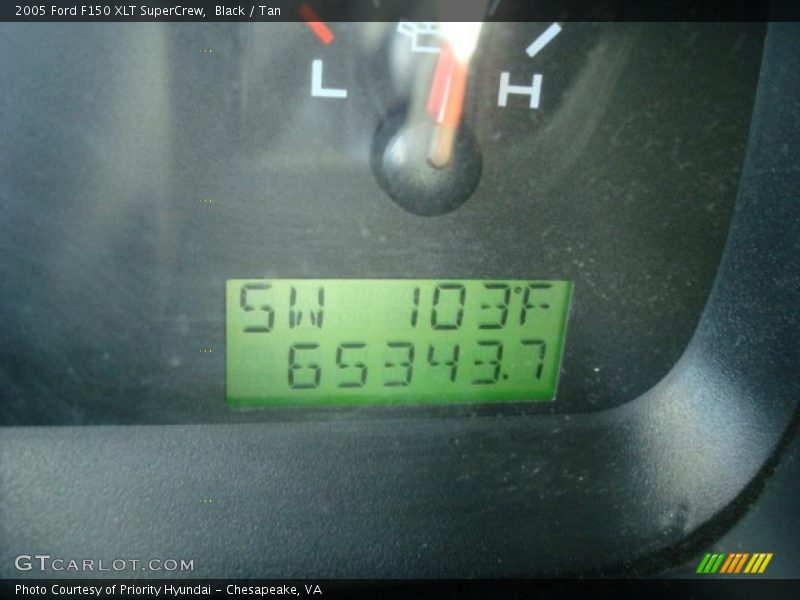 Black / Tan 2005 Ford F150 XLT SuperCrew