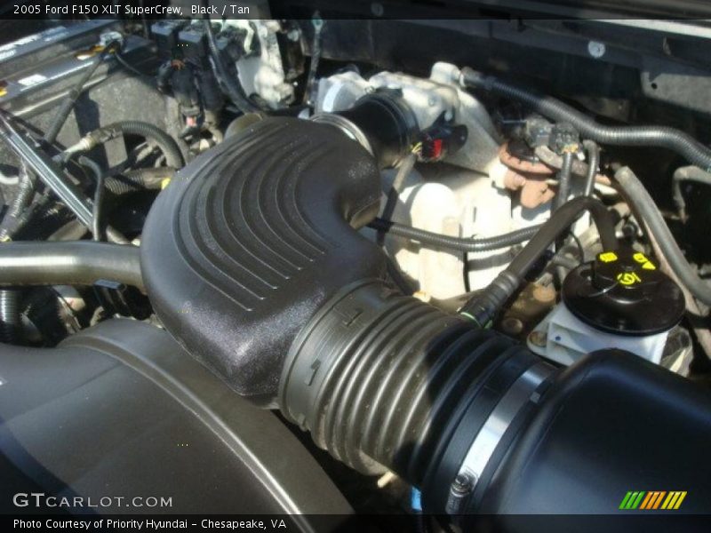 Black / Tan 2005 Ford F150 XLT SuperCrew