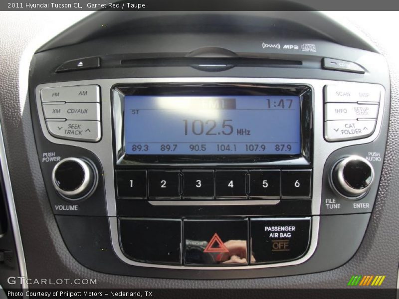 Garnet Red / Taupe 2011 Hyundai Tucson GL