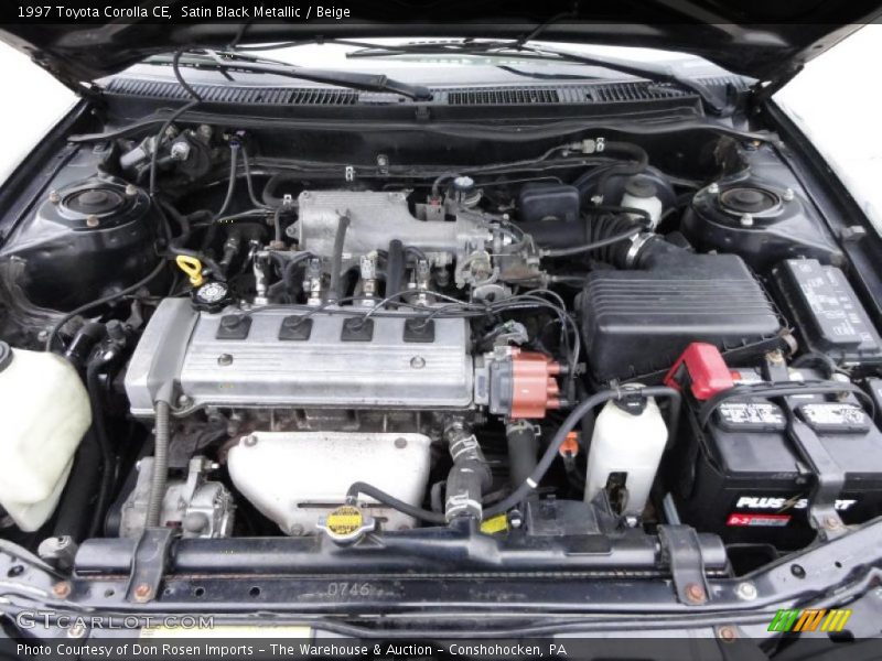 Satin Black Metallic / Beige 1997 Toyota Corolla CE