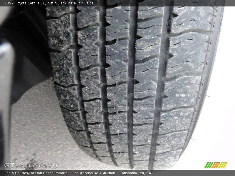 Satin Black Metallic / Beige 1997 Toyota Corolla CE