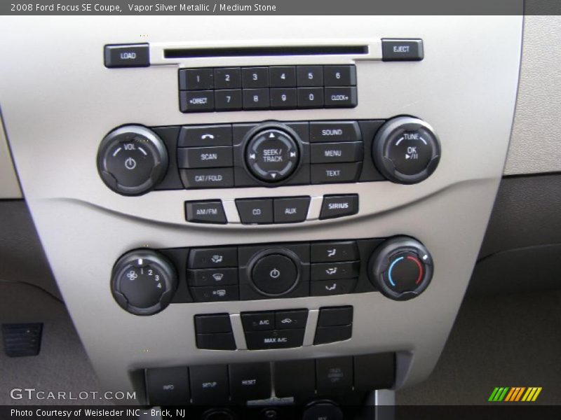 Vapor Silver Metallic / Medium Stone 2008 Ford Focus SE Coupe