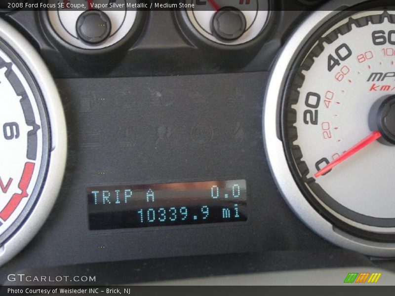 Vapor Silver Metallic / Medium Stone 2008 Ford Focus SE Coupe