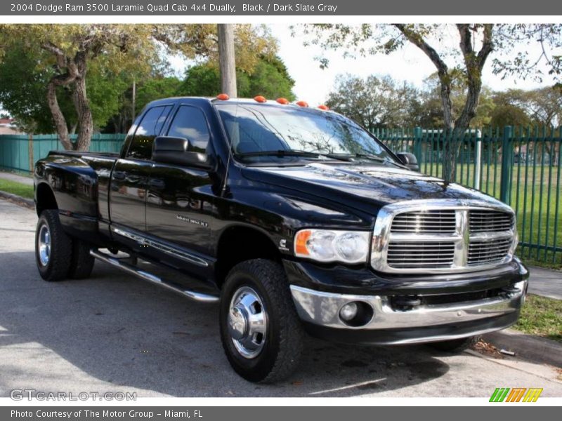 Front 3/4 View of 2004 Ram 3500 Laramie Quad Cab 4x4 Dually
