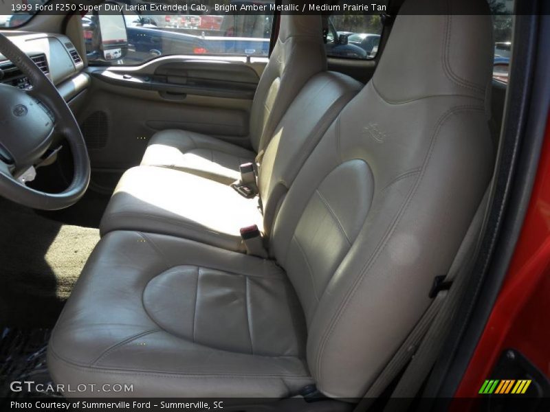 Bright Amber Metallic / Medium Prairie Tan 1999 Ford F250 Super Duty Lariat Extended Cab