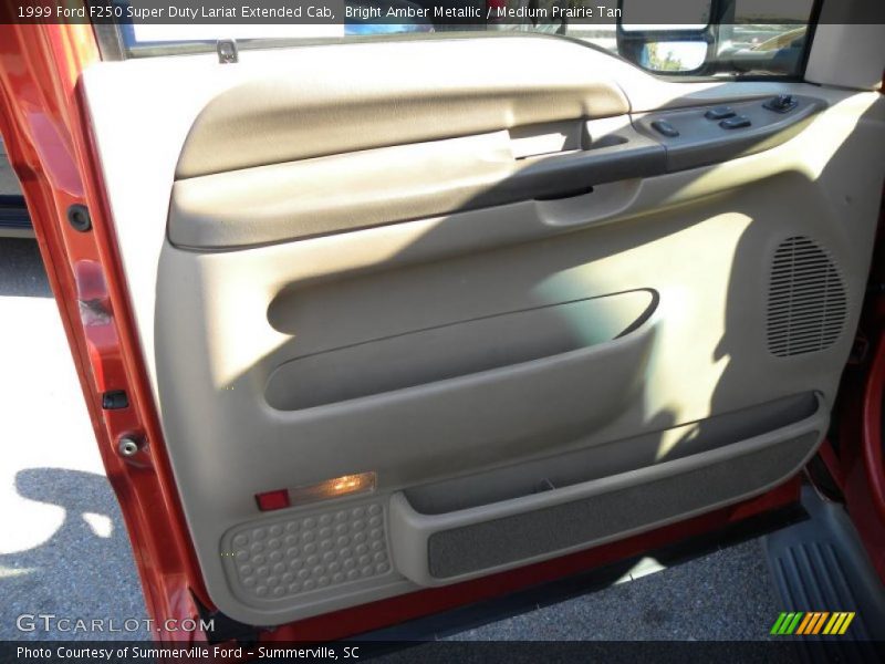 Bright Amber Metallic / Medium Prairie Tan 1999 Ford F250 Super Duty Lariat Extended Cab