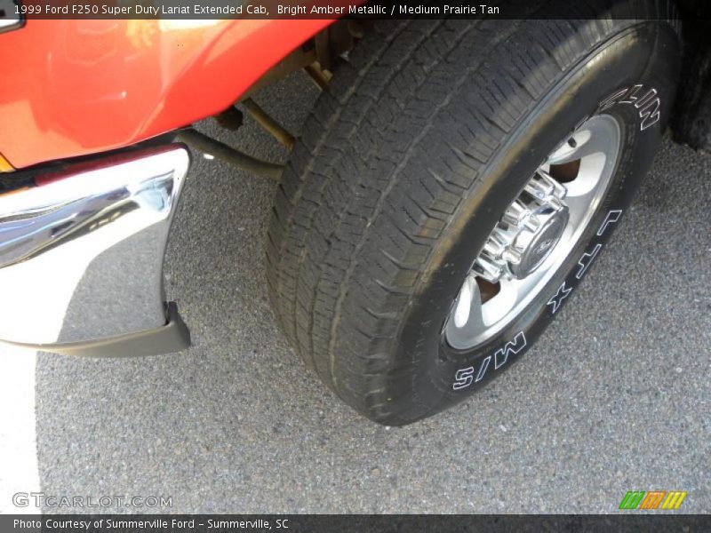 Bright Amber Metallic / Medium Prairie Tan 1999 Ford F250 Super Duty Lariat Extended Cab