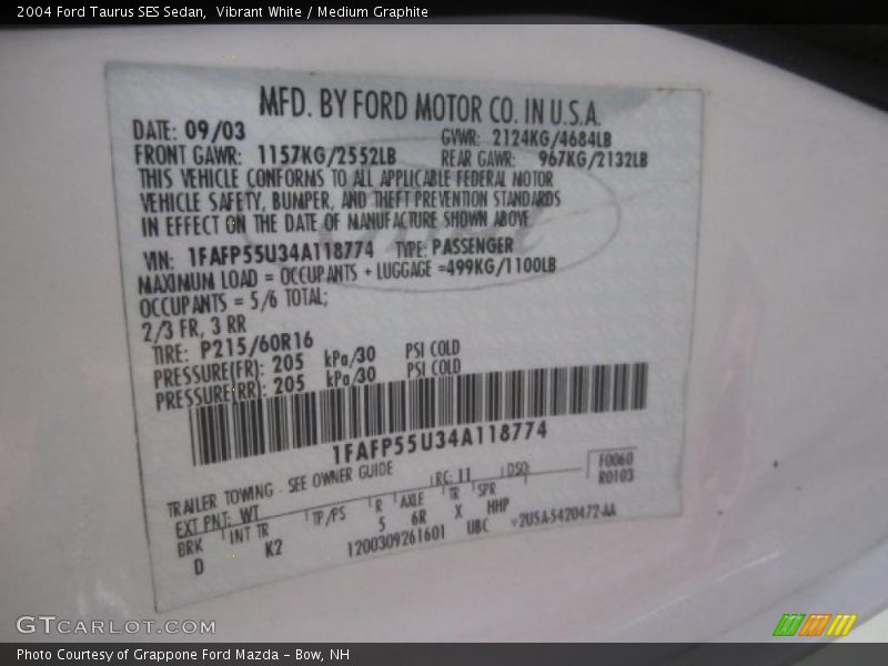 Vibrant White / Medium Graphite 2004 Ford Taurus SES Sedan