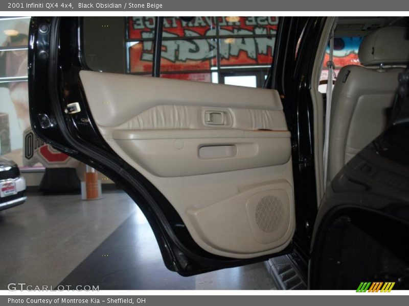 Black Obsidian / Stone Beige 2001 Infiniti QX4 4x4