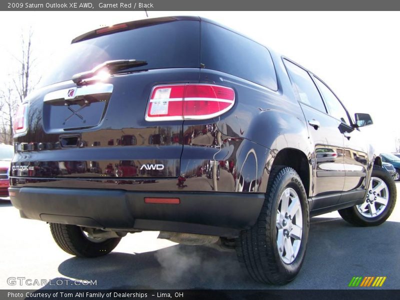 Garnet Red / Black 2009 Saturn Outlook XE AWD