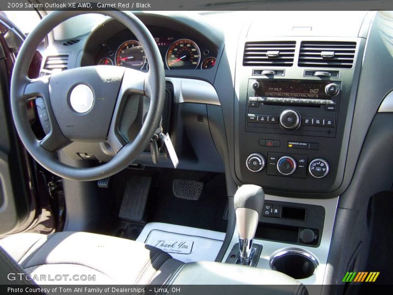 Garnet Red / Black 2009 Saturn Outlook XE AWD