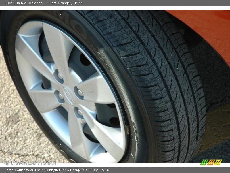 Sunset Orange / Beige 2009 Kia Rio LX Sedan