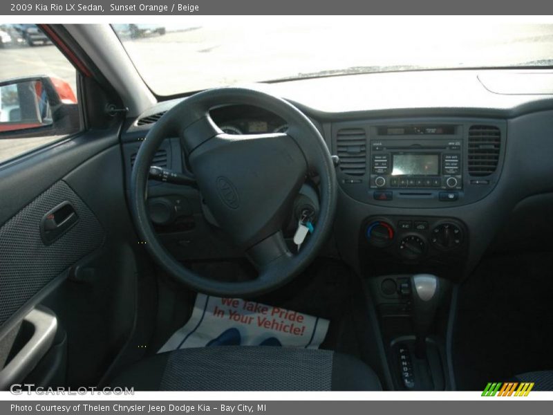 Sunset Orange / Beige 2009 Kia Rio LX Sedan