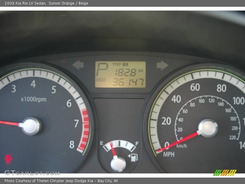 Sunset Orange / Beige 2009 Kia Rio LX Sedan