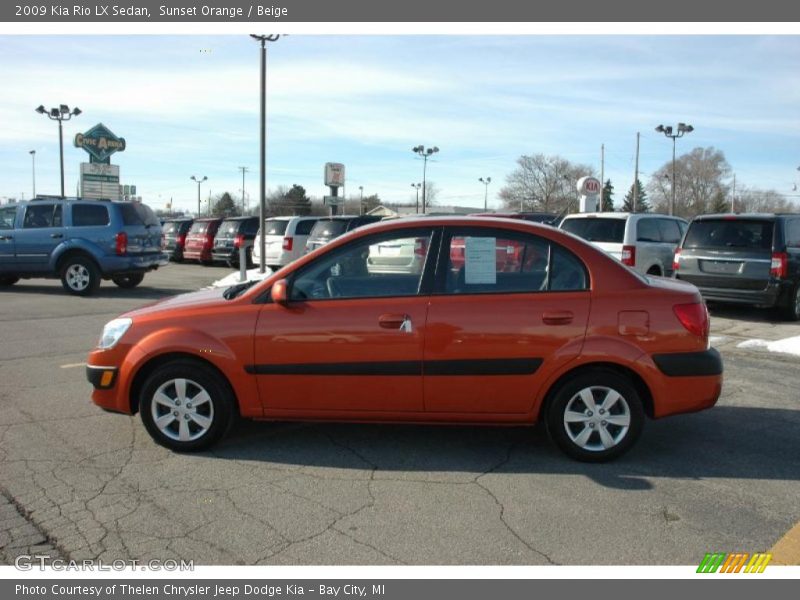 Sunset Orange / Beige 2009 Kia Rio LX Sedan