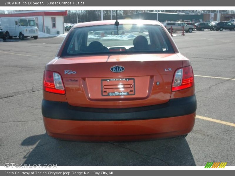Sunset Orange / Beige 2009 Kia Rio LX Sedan