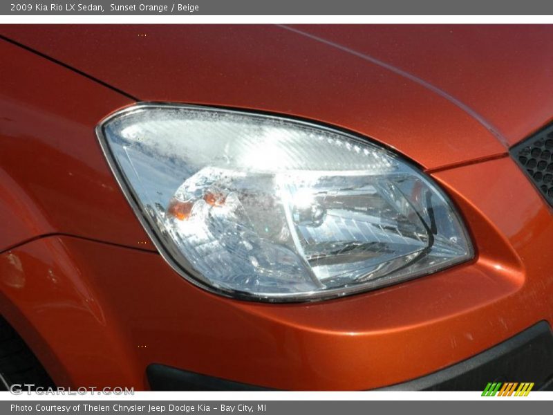 Sunset Orange / Beige 2009 Kia Rio LX Sedan