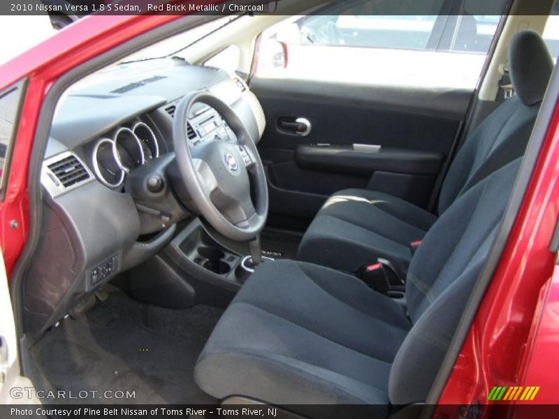 Red Brick Metallic / Charcoal 2010 Nissan Versa 1.8 S Sedan