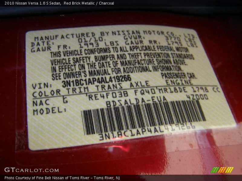 Red Brick Metallic / Charcoal 2010 Nissan Versa 1.8 S Sedan
