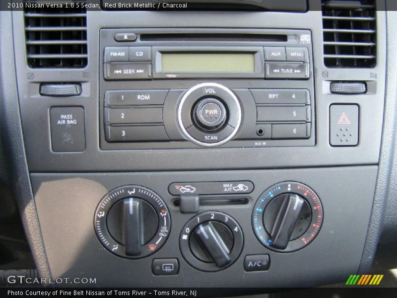 Red Brick Metallic / Charcoal 2010 Nissan Versa 1.8 S Sedan