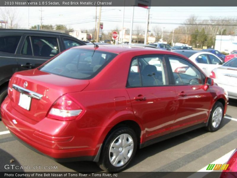 Red Brick Metallic / Charcoal 2010 Nissan Versa 1.8 S Sedan