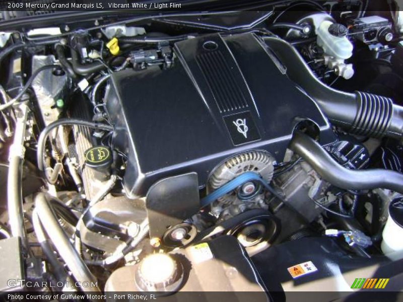 Vibrant White / Light Flint 2003 Mercury Grand Marquis LS