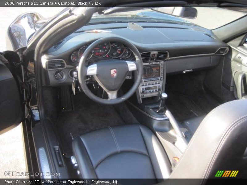 Black / Black 2006 Porsche 911 Carrera 4 Cabriolet