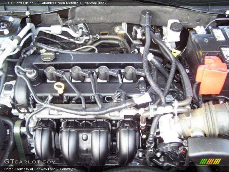 Atlantis Green Metallic / Charcoal Black 2010 Ford Fusion SE