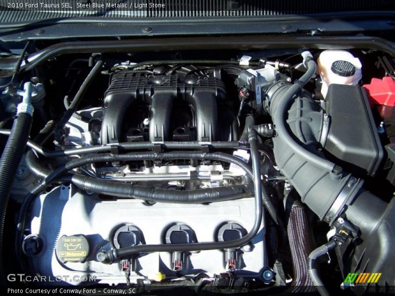 Steel Blue Metallic / Light Stone 2010 Ford Taurus SEL