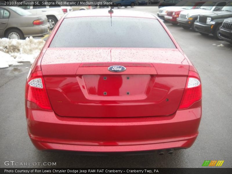 Sangria Red Metallic / Medium Light Stone 2010 Ford Fusion SE