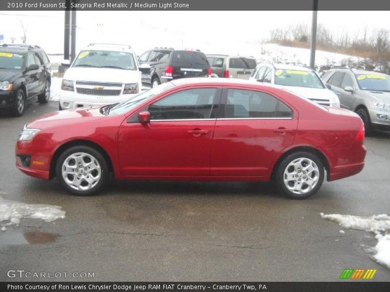 Sangria Red Metallic / Medium Light Stone 2010 Ford Fusion SE