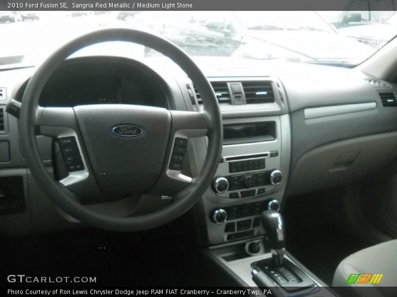 Sangria Red Metallic / Medium Light Stone 2010 Ford Fusion SE